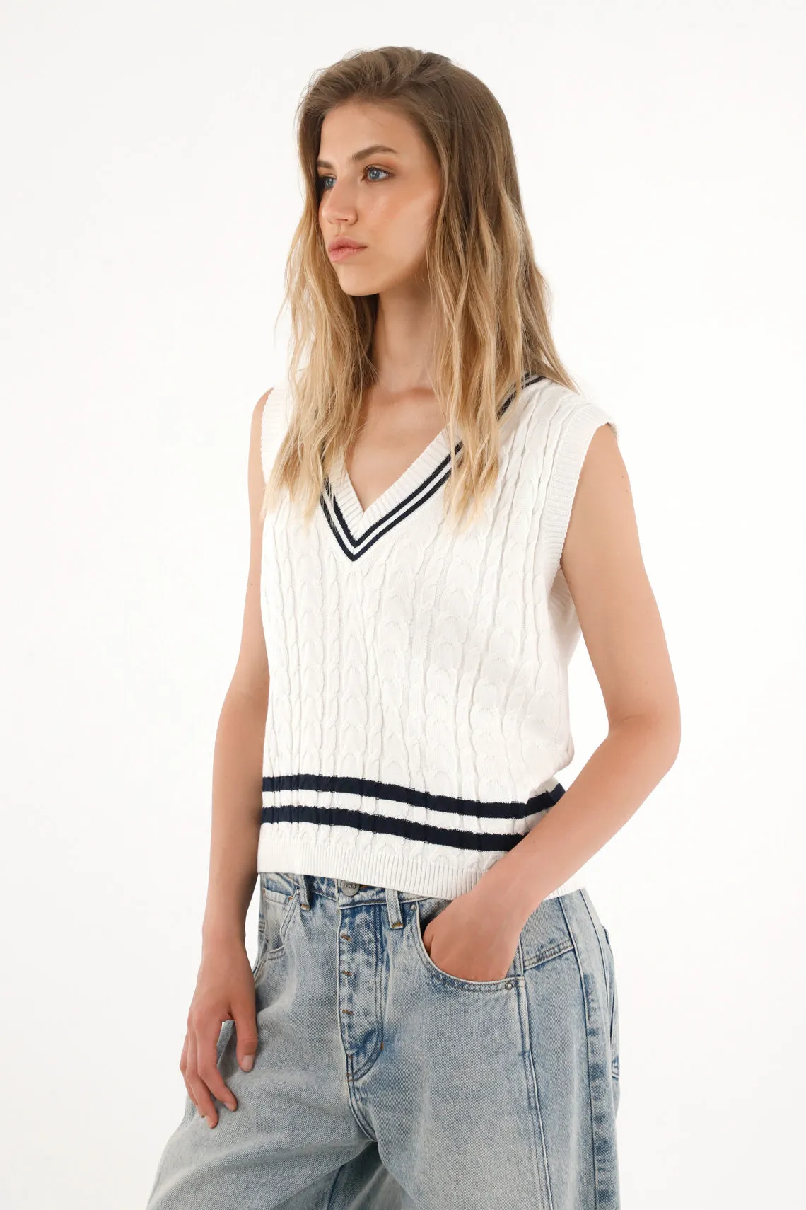 Women's cream knitted vest with striped design